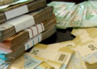 Avtomobildən külli miqdarda saxta pul tapıldı