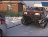 Təkərləri söküb yerinə tank tırtılı düzəltdi