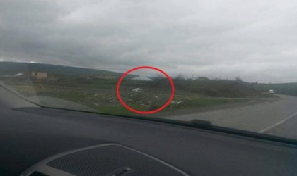 Təpənin arxasında yol polisi gizlənib