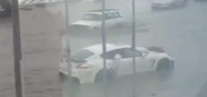 "Porsche"dən suyu vedrə ilə boşaltdılar