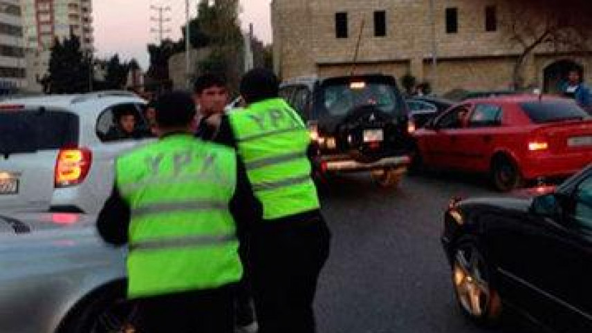 Bakıda ata və iki oğlu yol polislərini döydülər