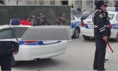 Yol polisləri ilə sürücü əlbəyaxa oldu  – YENİ VİDEO
