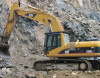 Ekskavator 100 metrdən yerə çırpıldı