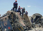 Yük avtomobili qatarla toqquşdu: 18 ölü, 98 yaralı