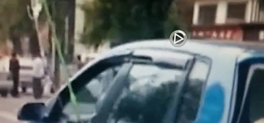 Qadın qolunda sistem ola-ola maşın sürdü
